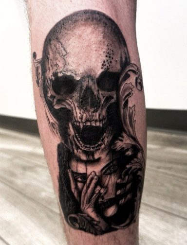 Detailed custom, black and grey, realism tattoo of a skull with expressive features, and a woman